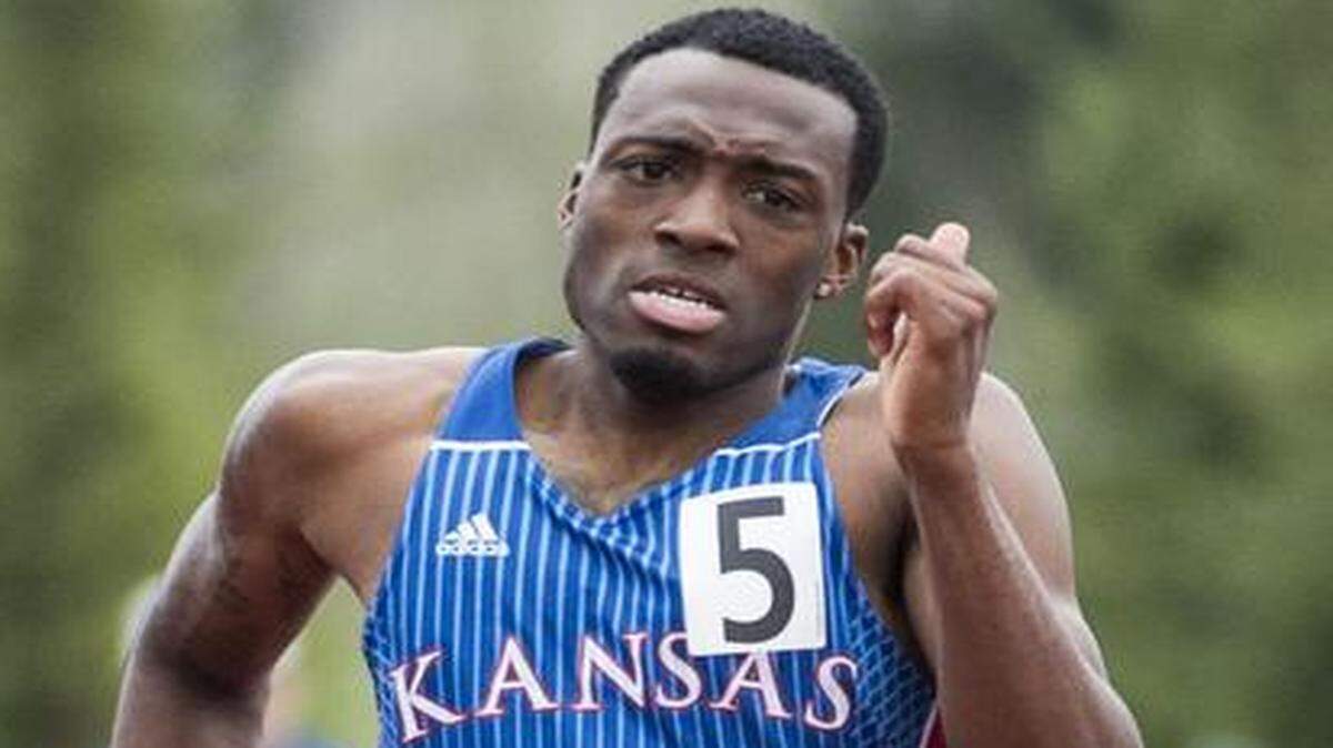 
University of Kansas Michael Stigler (right) runs away from the pack in the last heat of the 400 meter hurdles during the Kansas Relays at Rock Chalk Park on Friday, April 17, 2015, in Lawrence, Kansas.
