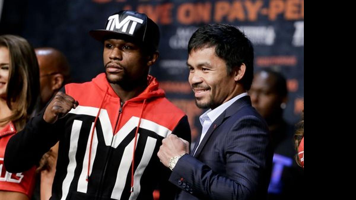
Boxers Floyd Mayweather Jr., left, and Manny Pacquiao at a press conference Wednesday in Las Vegas. 