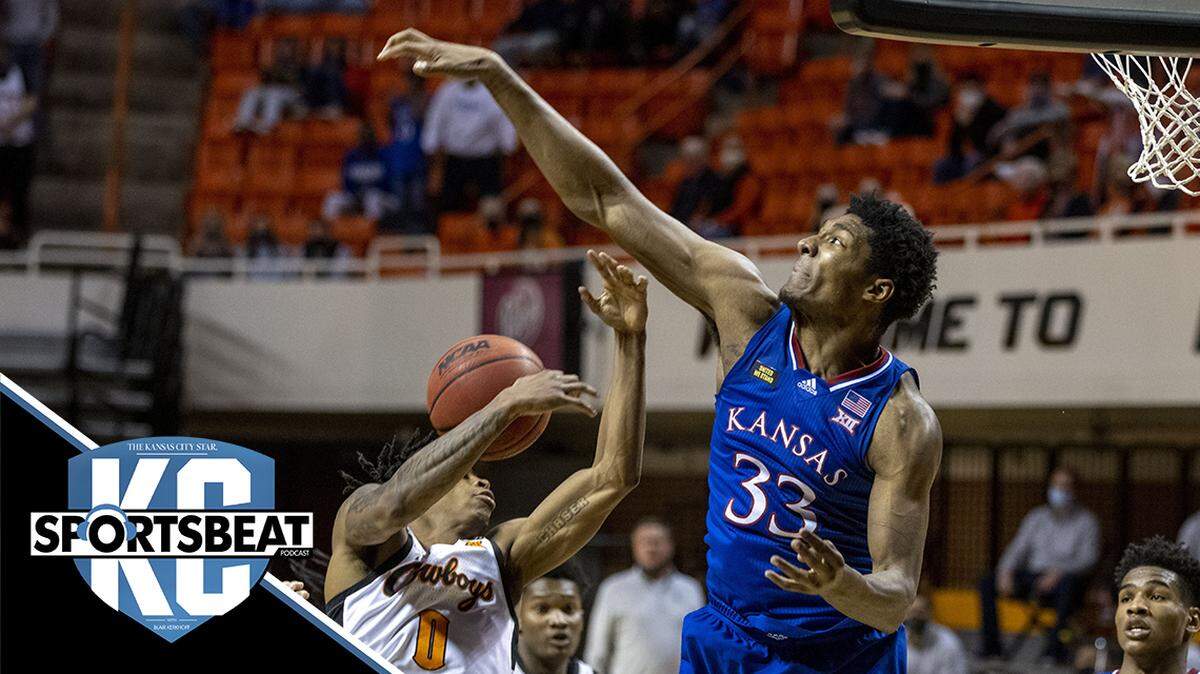 Kansas’ David McCormack (33) blocks Oklahoma State’s Avery Anderson III (0) shot during the second half of the NCAA college basketball game in Stillwater, Okla., Tuesday, Jan. 12, 2021.