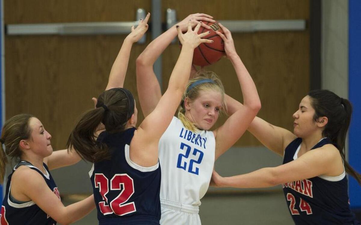 Among the Northland high school basketball teams tackling playoff games this week are the Liberty High School girls squad, and player Morgan Fleming (with ball). The Blue Jays and both the Liberty North and Park Hill South boys squads will play in the Missouri Class 5 sectionals on Wednesday. The St. Pius X girls, meanwhile, have advanced to the Missouri Class 3 state tournament this week and play Strafford in a semifinal game on Thursday in Columbia.