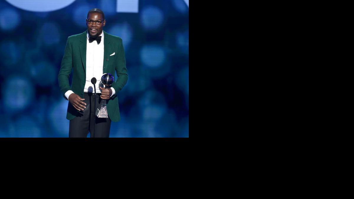 
Kevin Durant accepts the award for best male athlete at the ESPY Awards 
