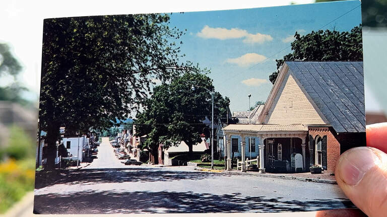Did this vintage postcard view of Weston miss the charm of the old river town?