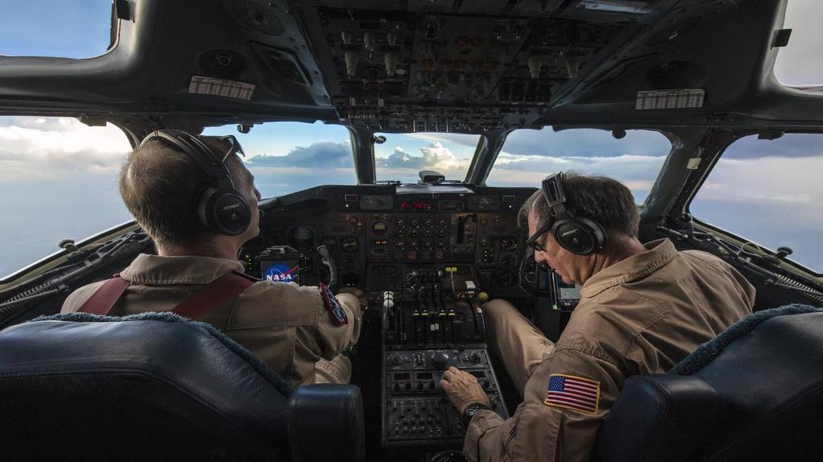 
NASA research pilots Gregory Slover (left) and Bill Brockett flew a converted jetliner Monday to gather storm data. Scientists spent the last several weeks over Kansas, Nebraska, Oklahoma and Texas studying nighttime storms.
